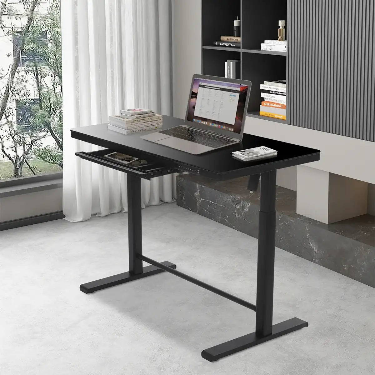 Minimalist beauty, maximum utility—spacious surface and a sleek integrated drawer.