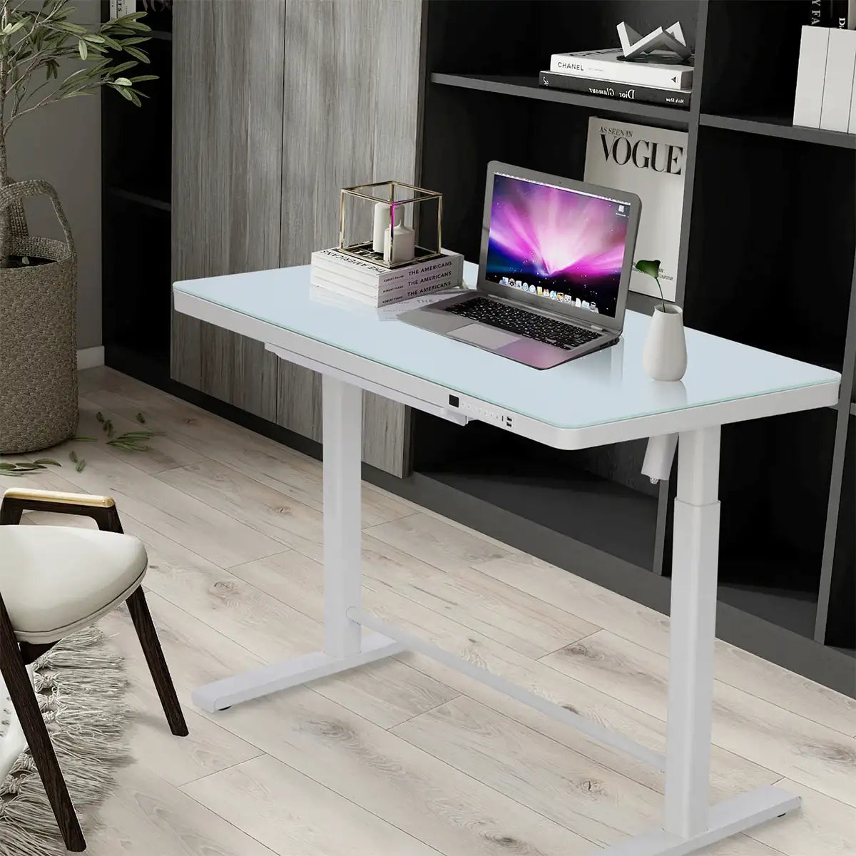 A modern masterpiece—polished white glass, seamless height control, and a discreet built-in drawer.