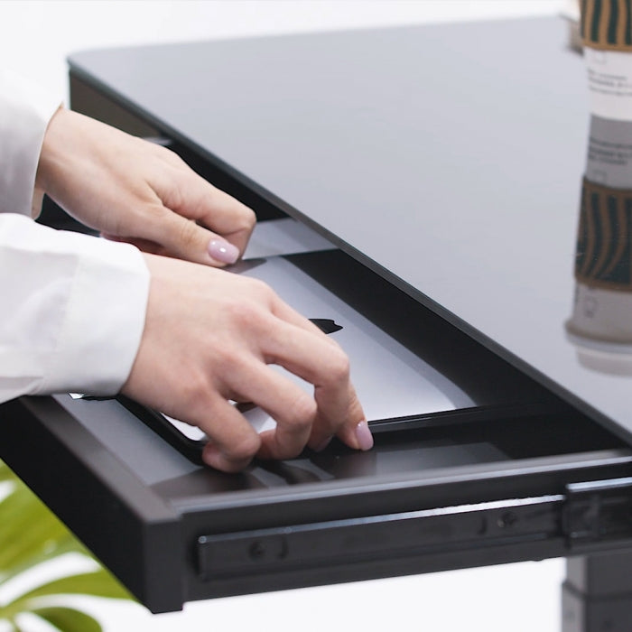 Smart storage meets sleek design—keep your workspace clutter-free with a built-in drawer.