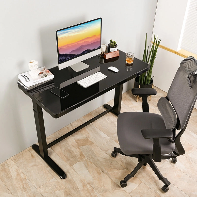 Plenty of room to multitask—spread out and stay efficient with a wide, durable glass surface.