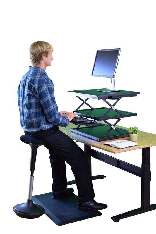 Why an Adjustable Desk Riser Is the Upgrade Every Office Professional Needs