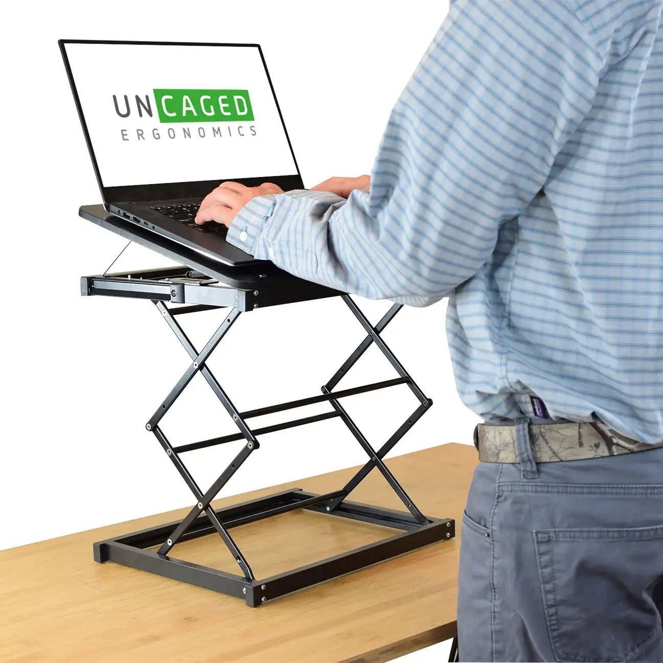 Height-adjustable laptop stand for comfort and convenience.